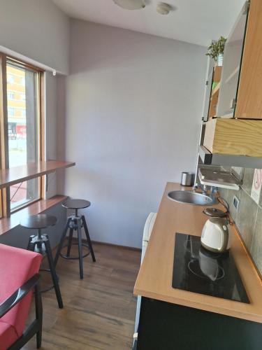 Moderan apartman u pešačkoj zoni Novog Sada kod Trga slobode i pozorišta.